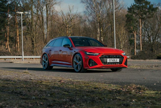 a red car parked on a road