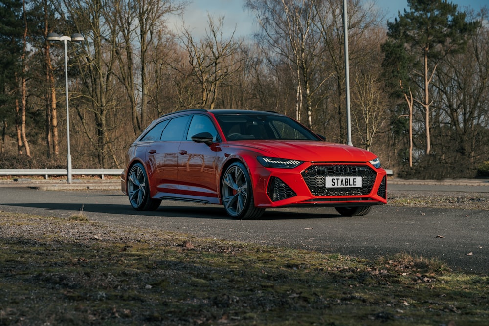 a red car parked on a road