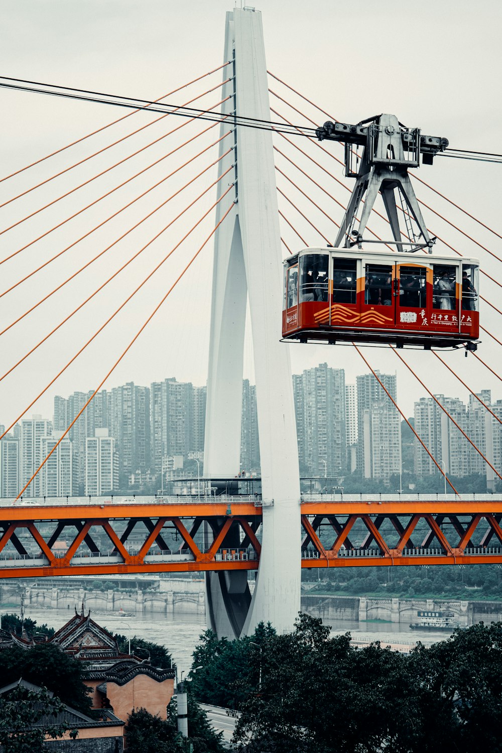 a cable car going over a bridge