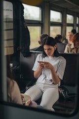 a person sitting on a bus