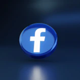 a blue logo with a cross
