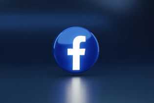 a blue logo with a white cross