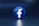 a blue logo with a white cross