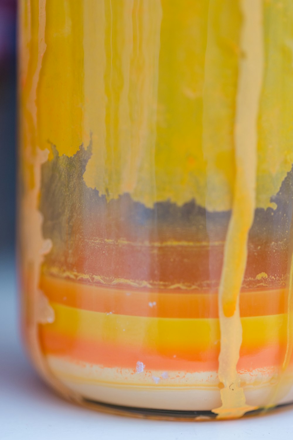 a close-up of a glass of orange juice