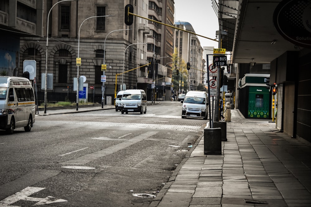 a street with cars and buildings