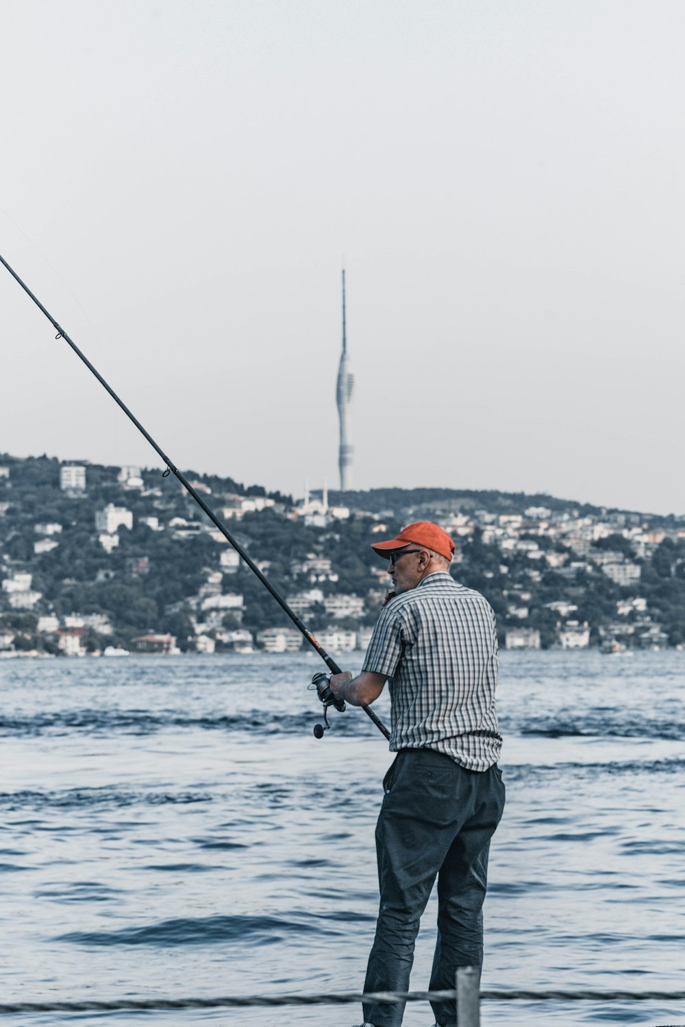 a man fishing on the water