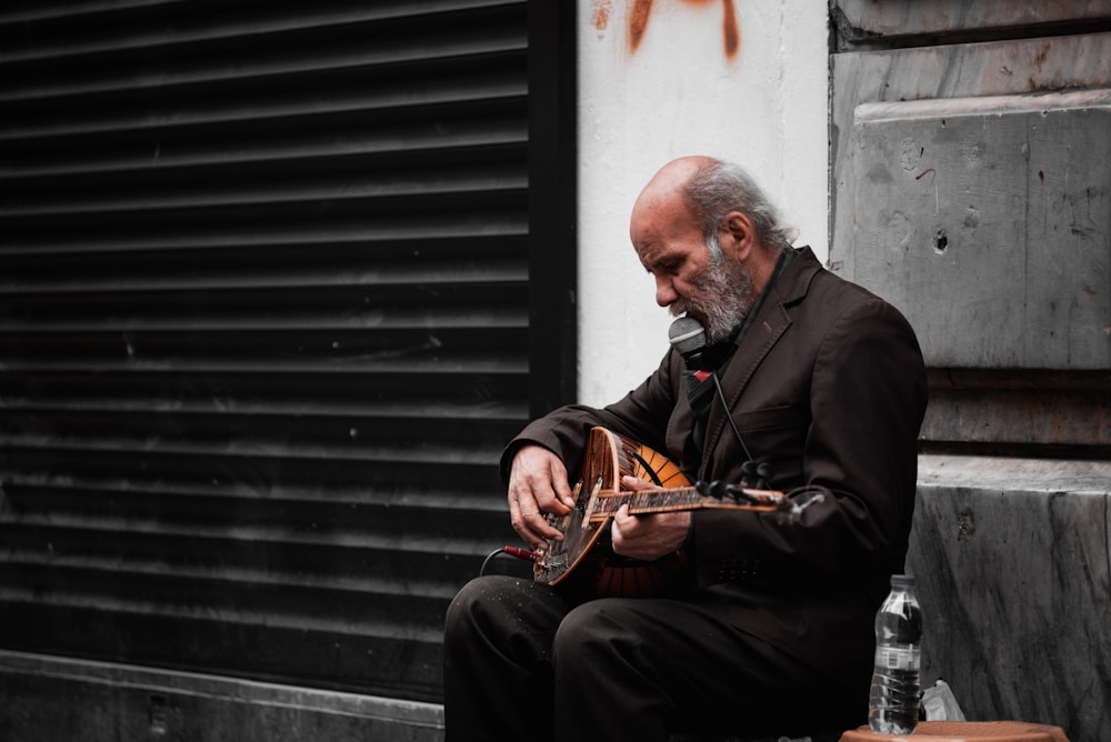 a person playing a guitar