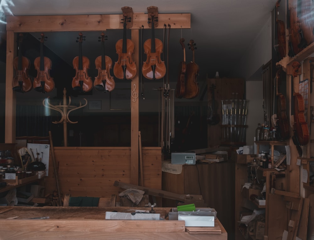 a room with guitars on the wall