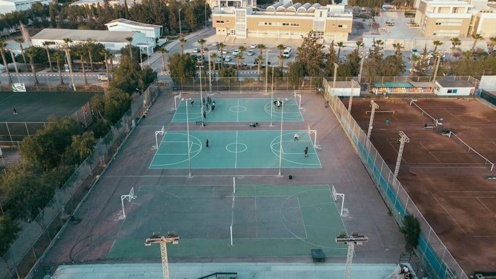 a tennis court with people on it