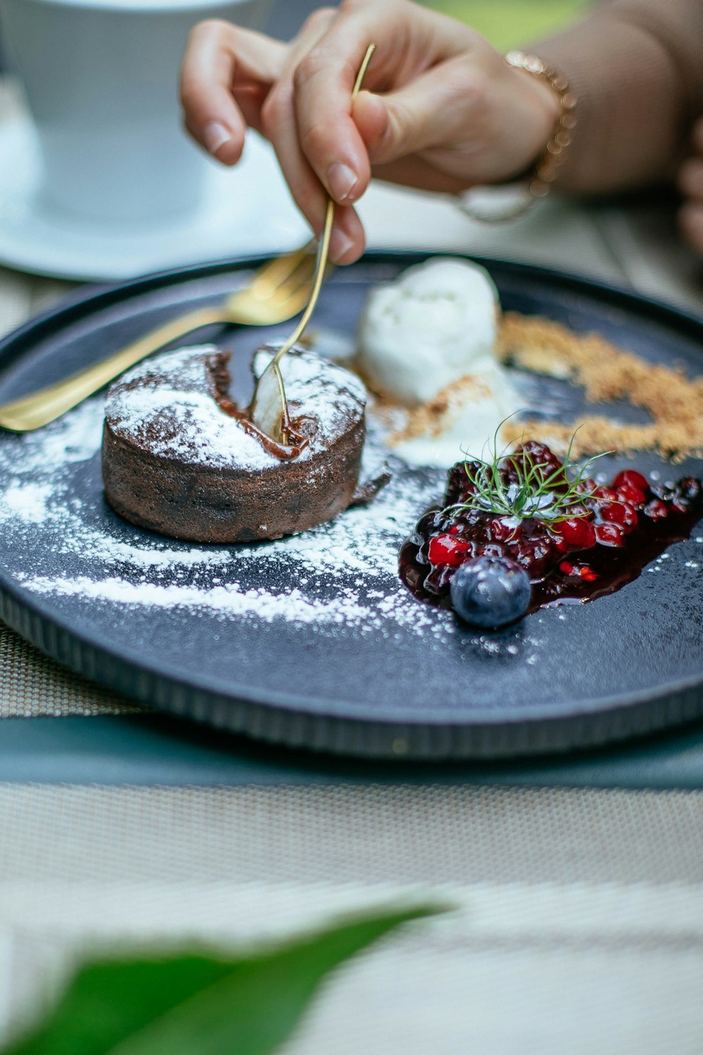 a person eating a dessert