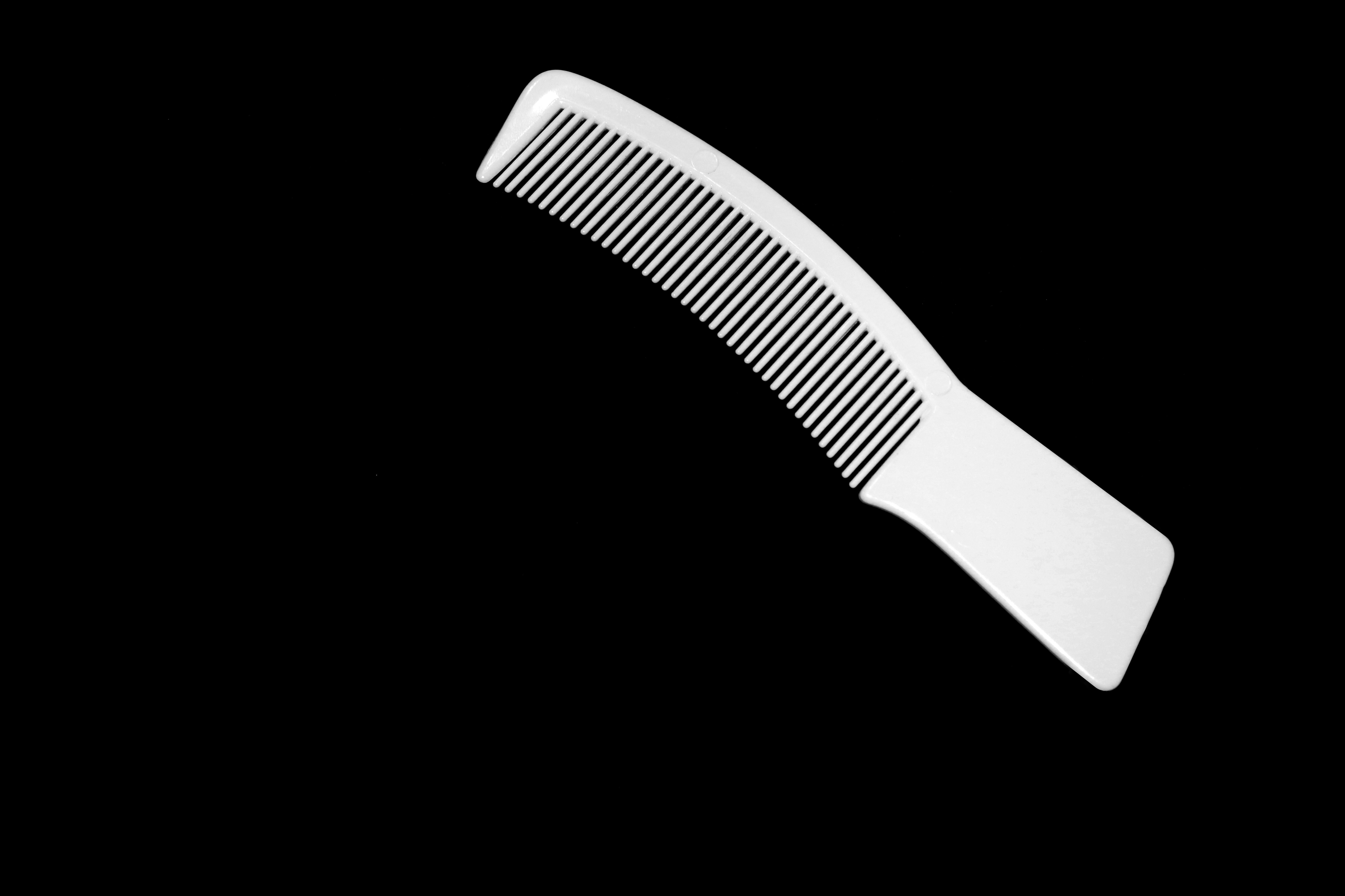 Hair Comb black background closeup