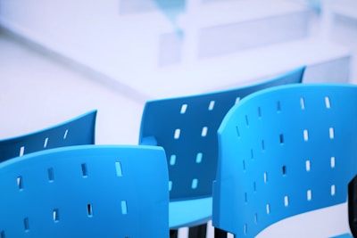 a group of blue chairs