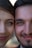 a man and woman taking a selfie