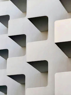 Wide shot of a minimalist building facade showcasing geometric shapes