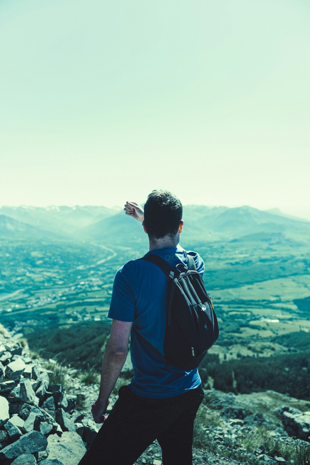 a man standing on a mountain