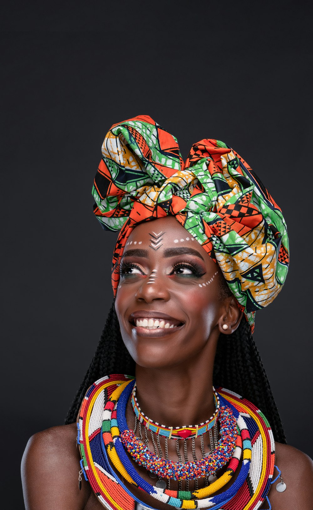 a person wearing a colorful headdress