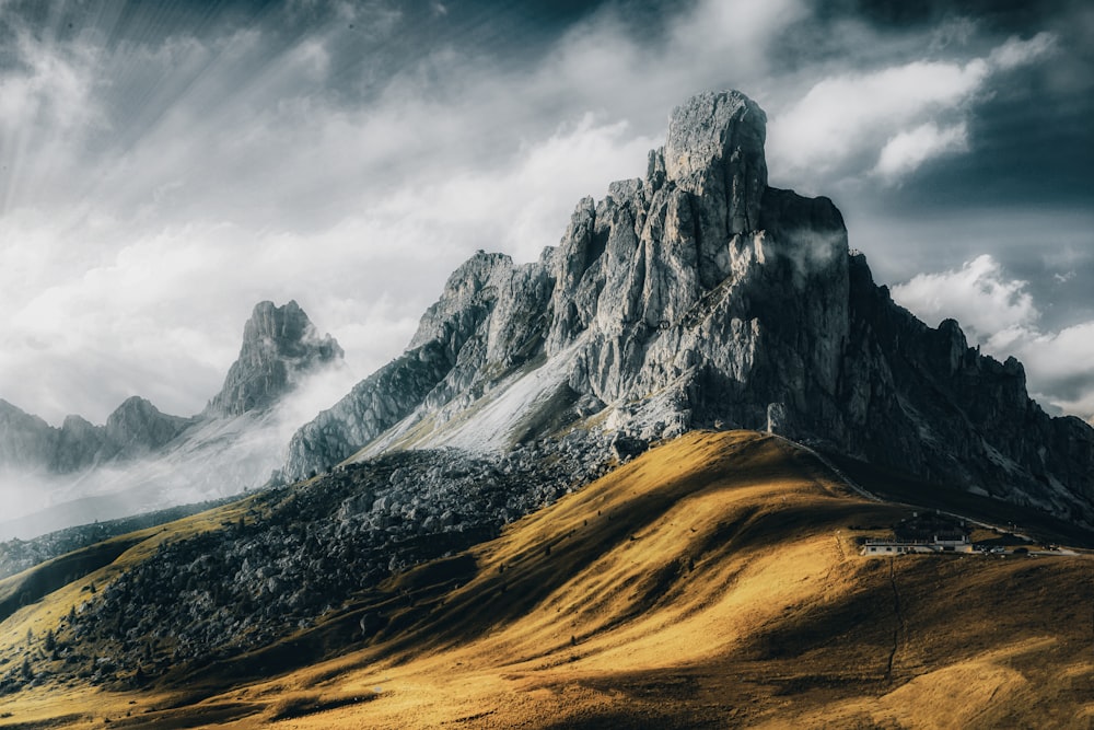 a mountain with clouds