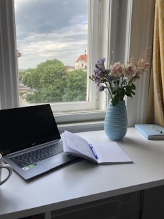 A serene workspace with a person engaged in thoughtful conversation, surrounded by nature.
