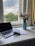 A serene workspace with a journal, plants, and a calming atmosphere.