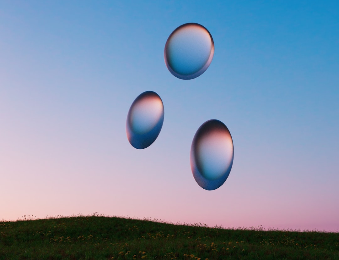 a group of balloons in the sky,