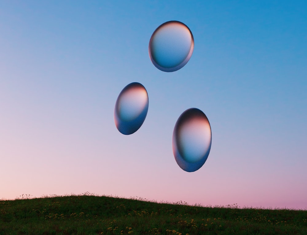 a group of balloons in the sky