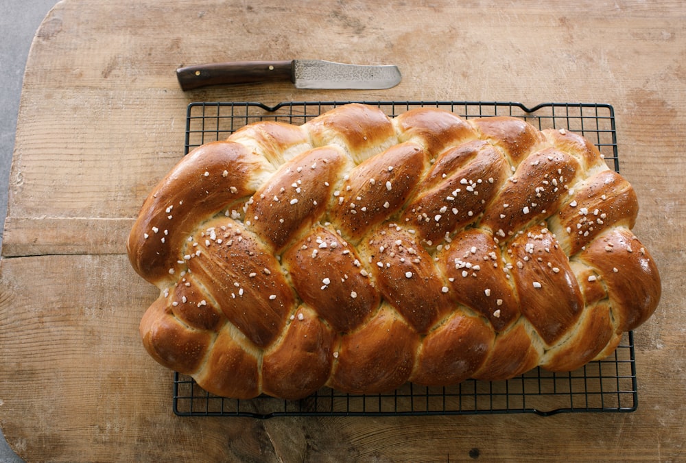 a loaf of bread on a cooling rack