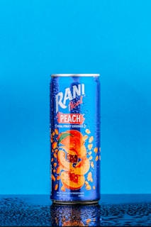 a can of beer on a table