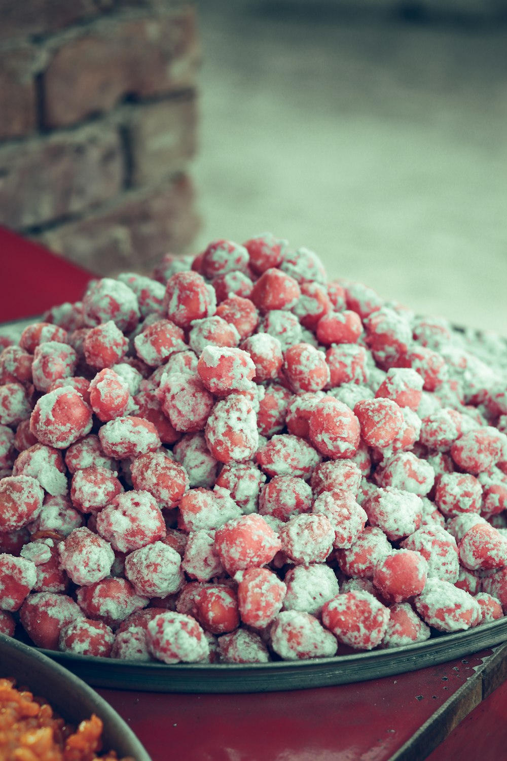 a bowl of red and white food