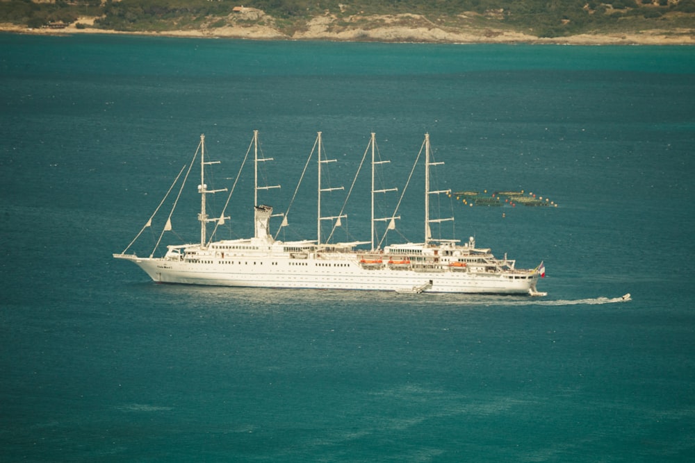 a large white boat on the water