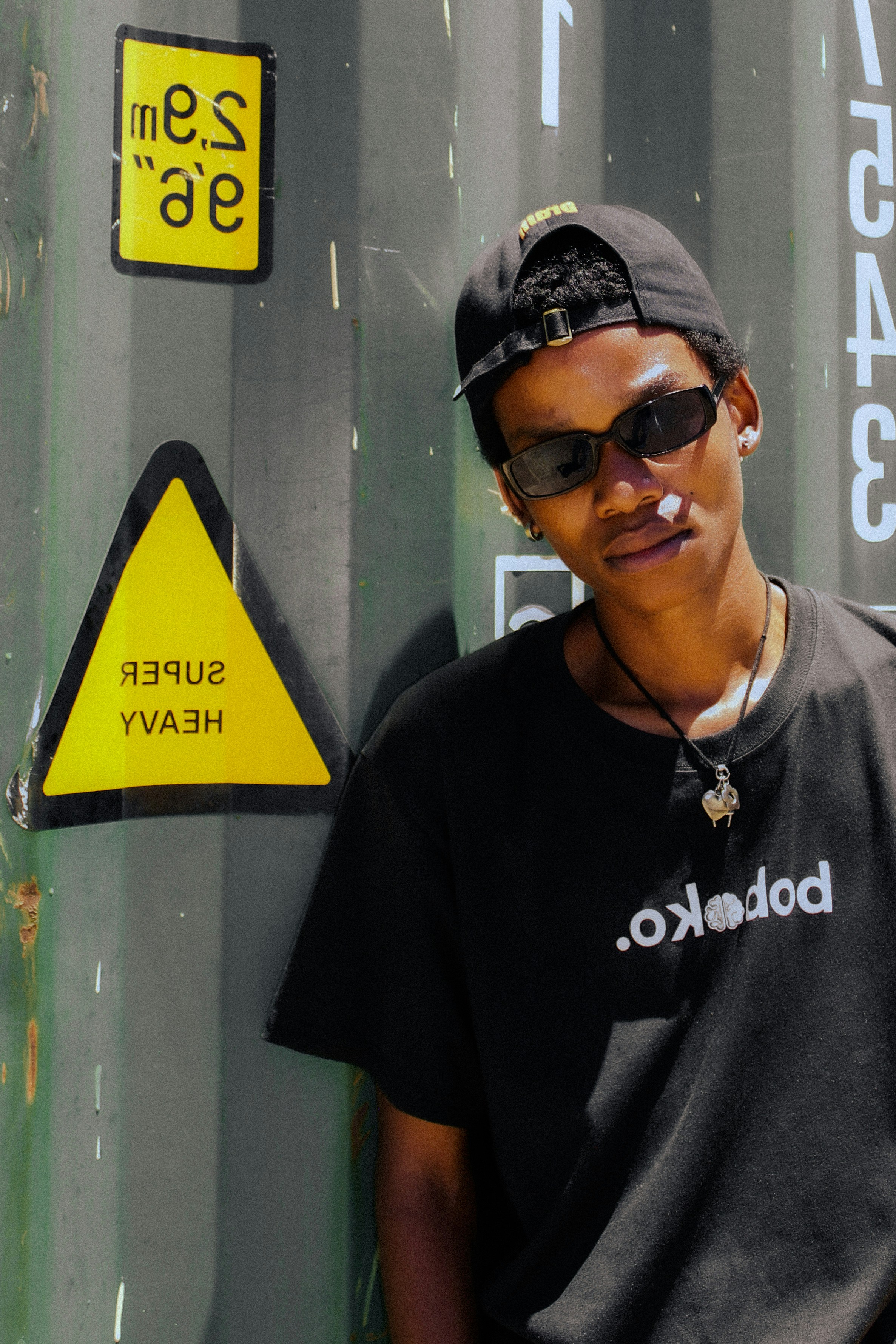 a man wearing sunglasses and a hat