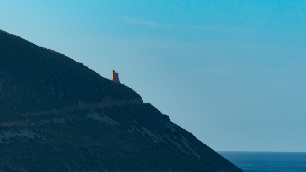 a building on a hill