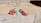 Close-up of colorful outdoor toys arranged neatly in a backyard.