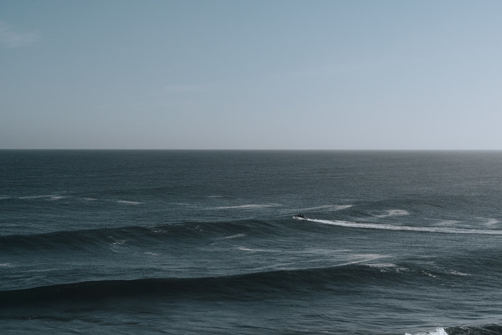 a body of water with waves