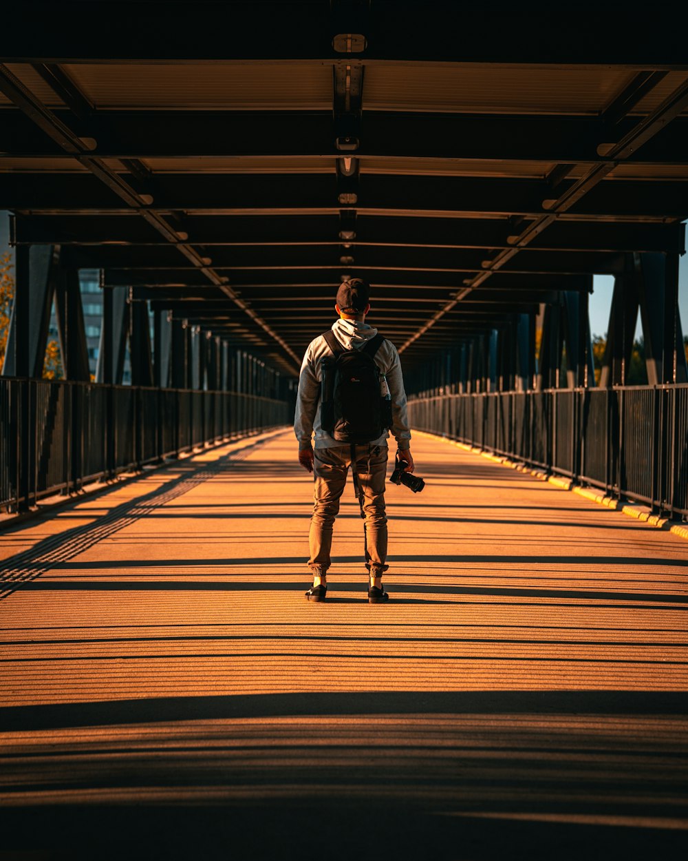 a person walking on a bridge