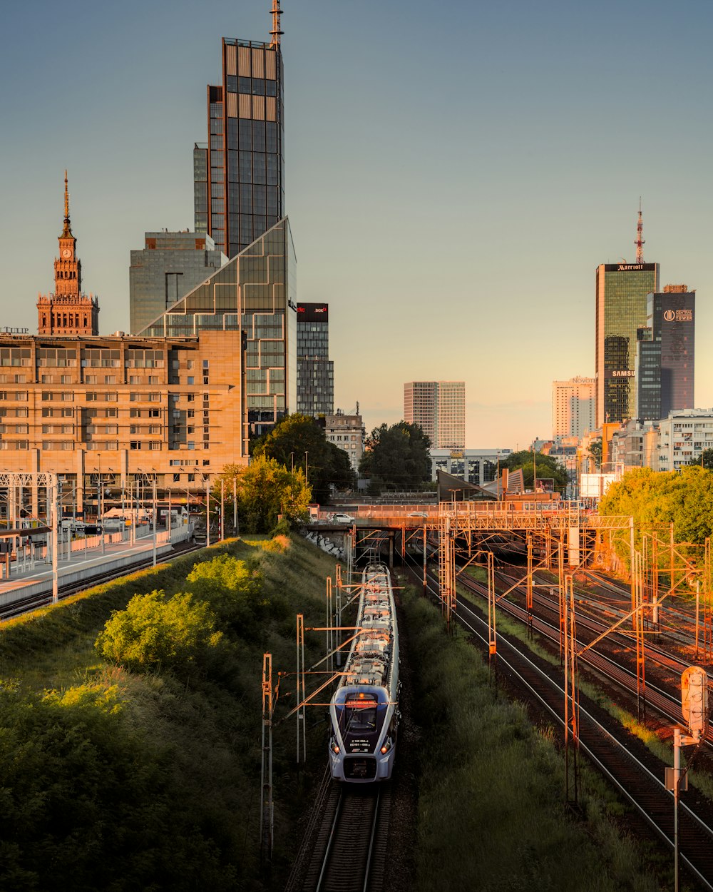 a train travels down the tracks