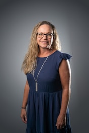 a woman in a blue dress