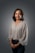 a person with a grey sweater