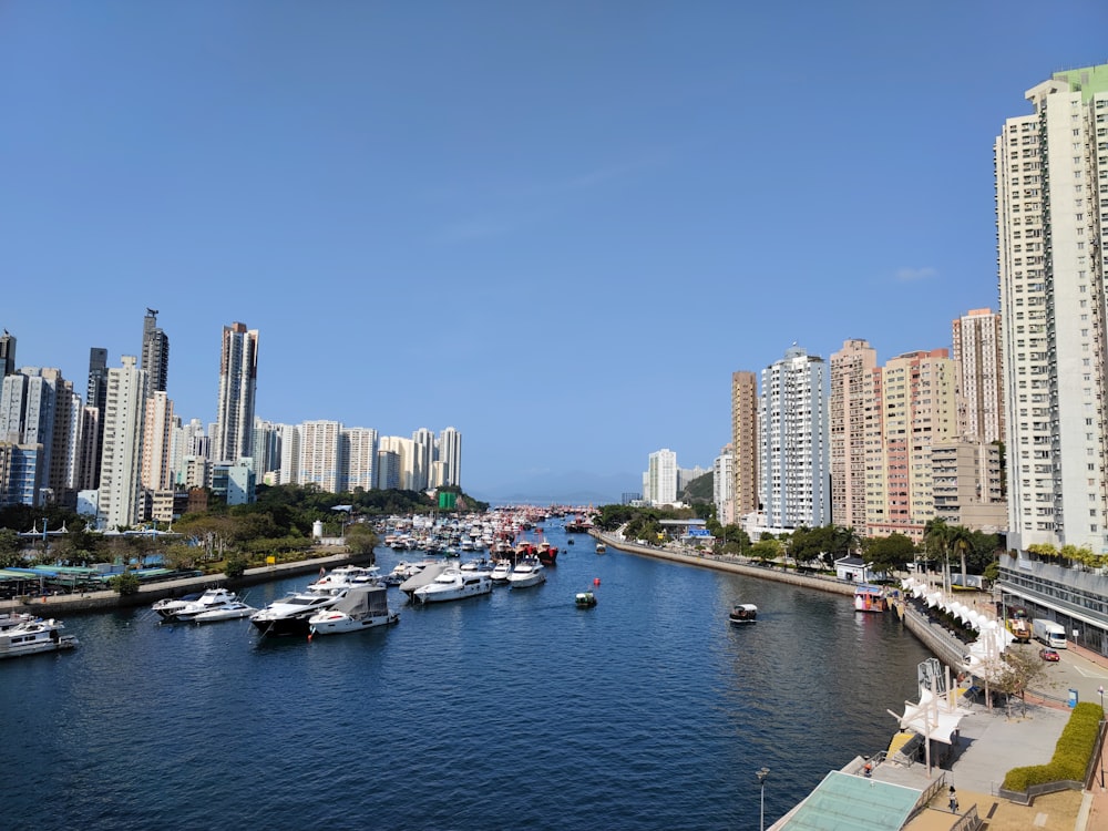 a body of water with boats in it and buildings around it