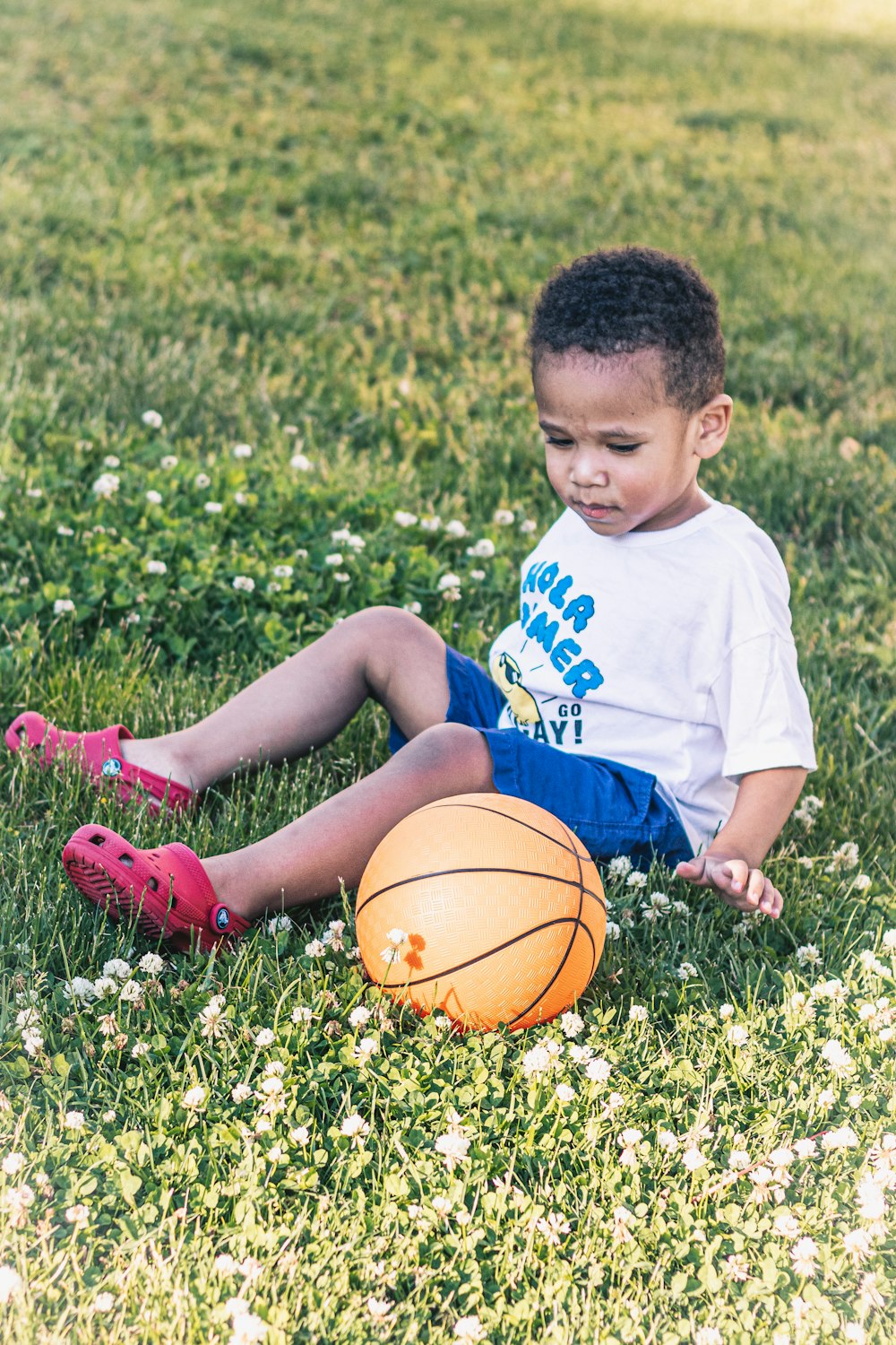 a child playing with a ball