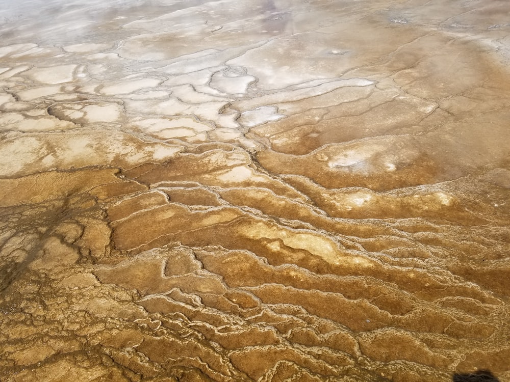 a rocky area with a river running through it