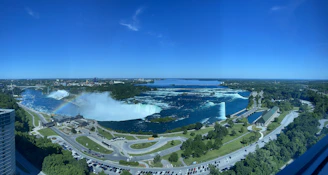 A panoramic view of a hidden waterfall discovered on a customized travel plan