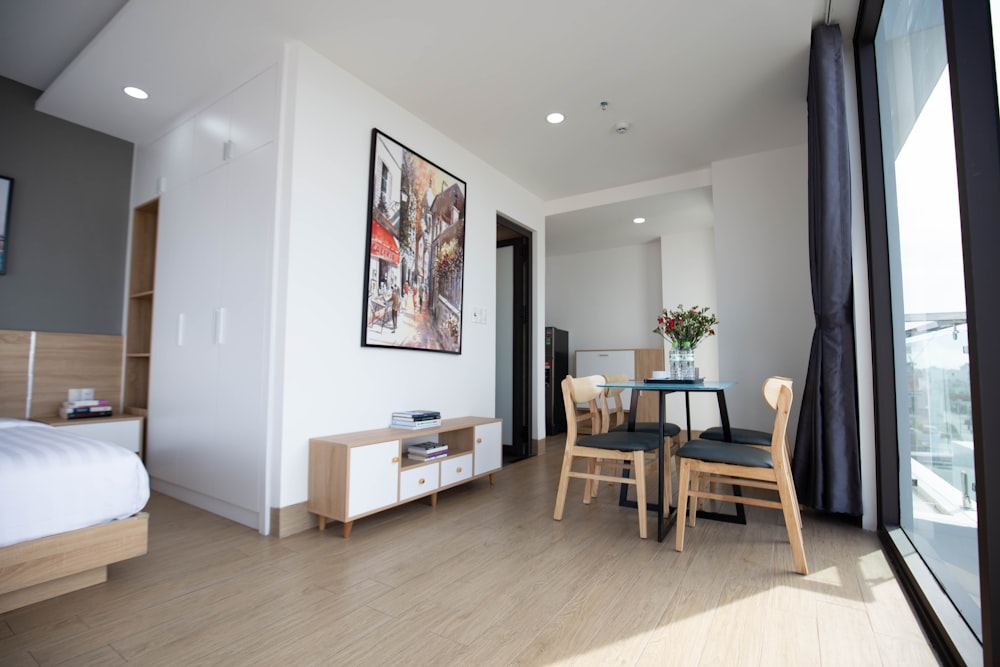 a room with a table and chairs