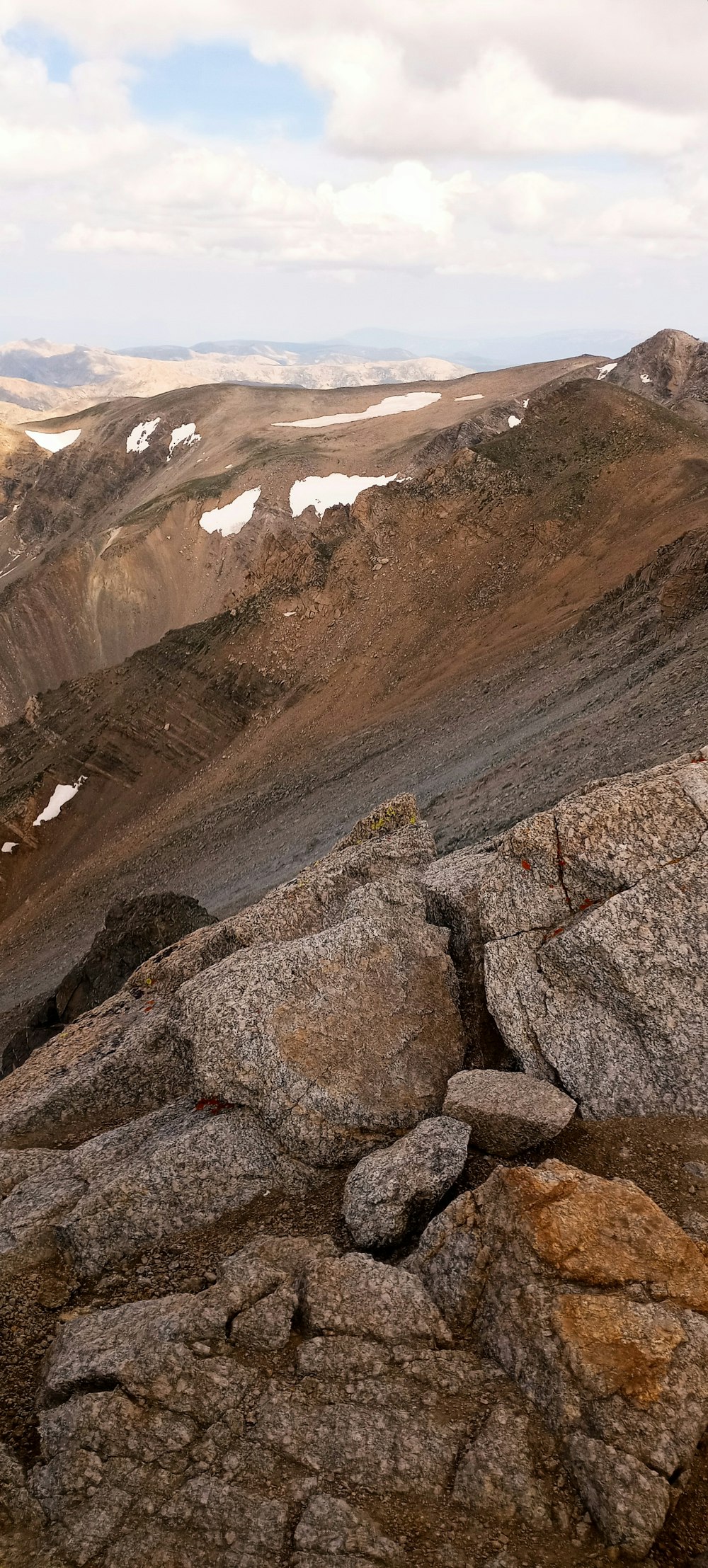 a rocky landscape with snow