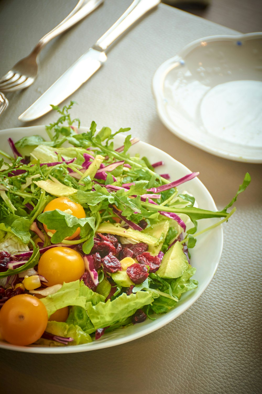 a salad with eggs and vegetables