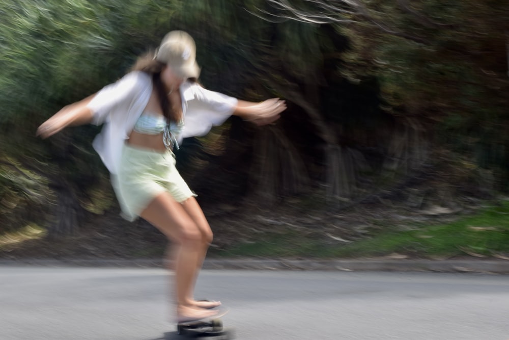 a person skateboards down a street