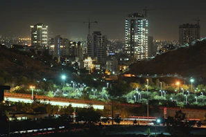 Nighttime cityscape highlighting illuminated infrastructure projects by Maheshwari Infratech