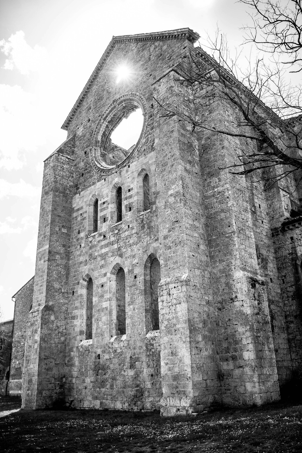 a stone building with a clock