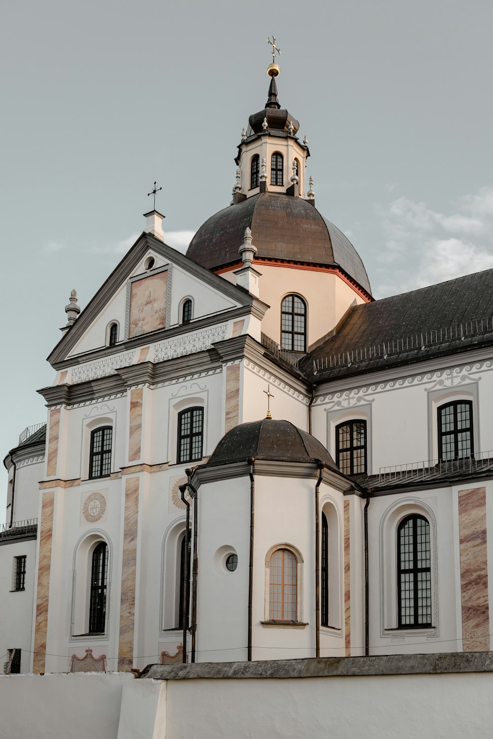 a white building with a tower