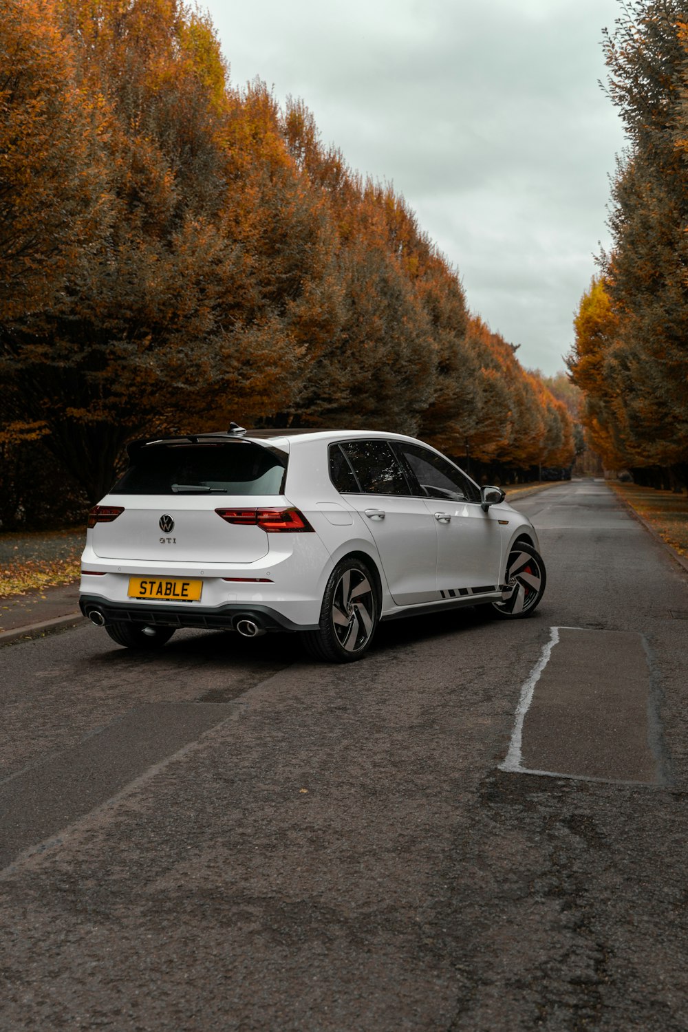 a white car parked on a road