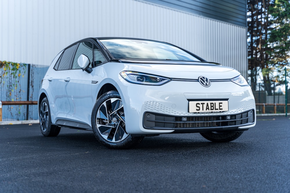 a white car parked on a street